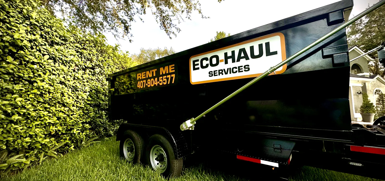 Eco Haul Services dump trailer at a customer home in Winter Park
